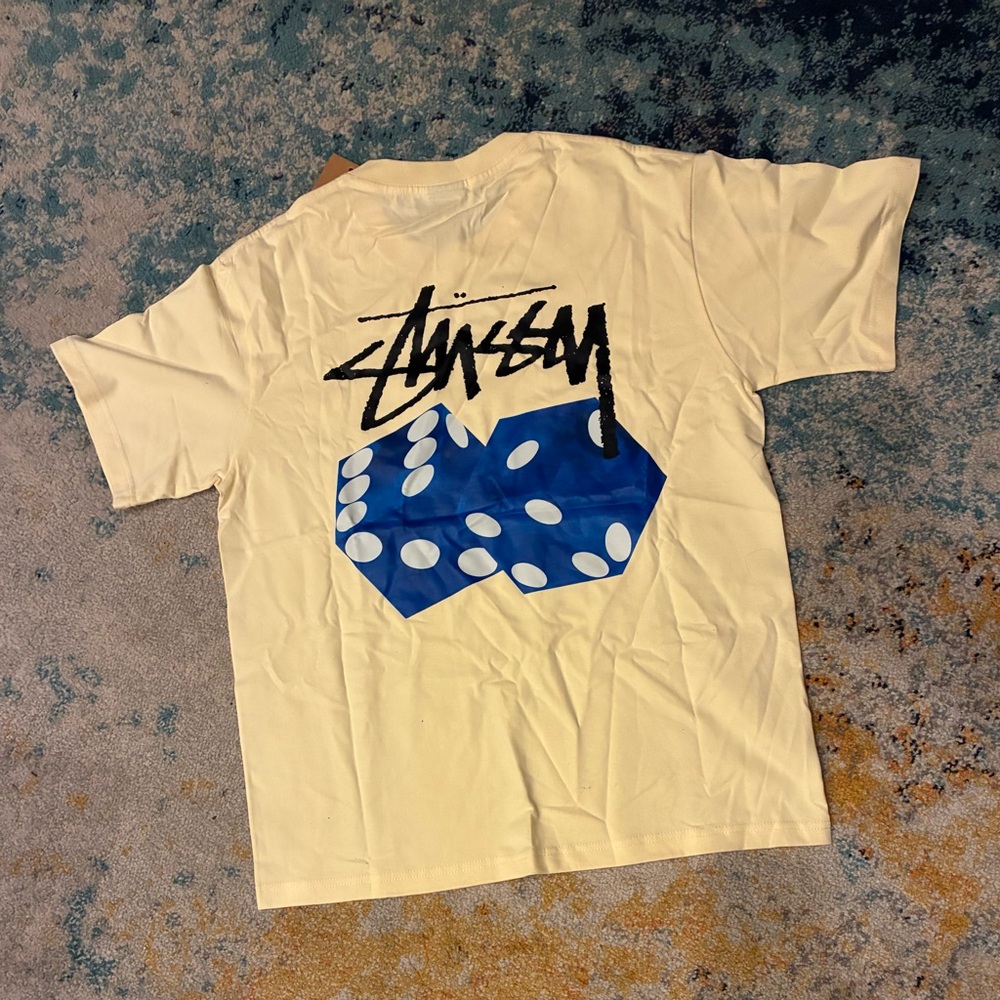 Stussy Cream Tee with Blue Dice Design